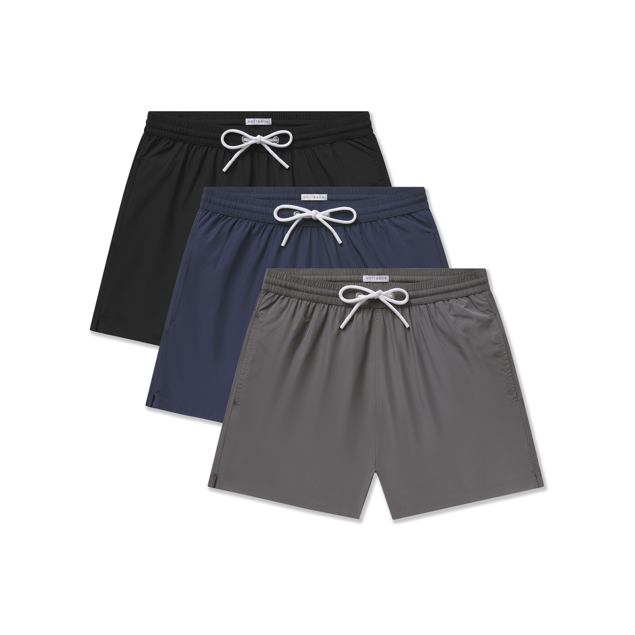  wearing Black/Navy/Dark Gray The Swim Trunk 3-Pack