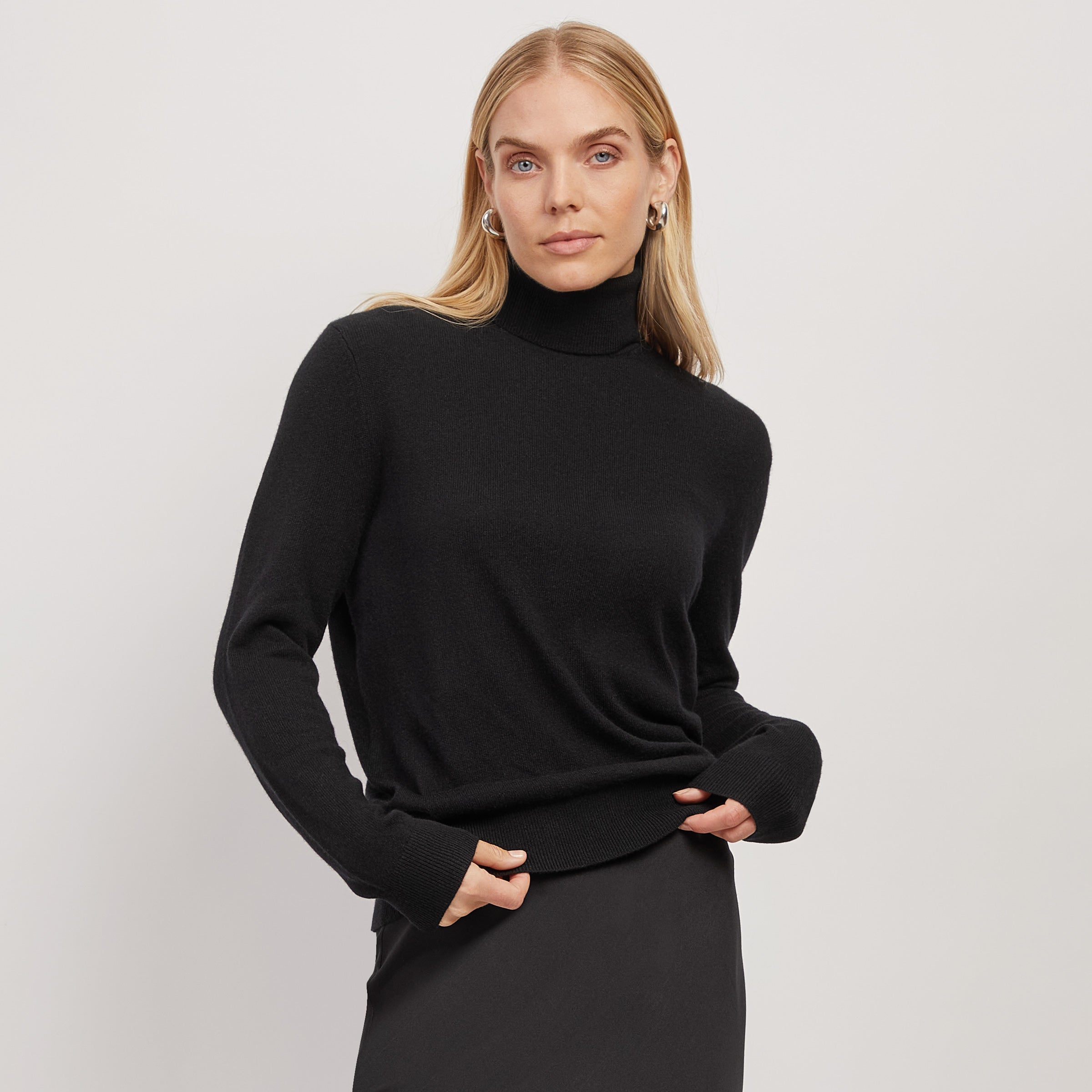 Women wearing Black Cashmere Turtleneck Willow Sweater